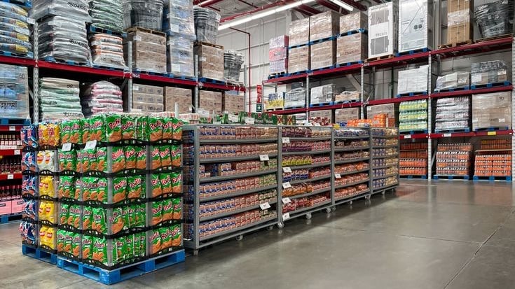 FMCG distribution warehouse with pallet racking and stocked inventory shelves