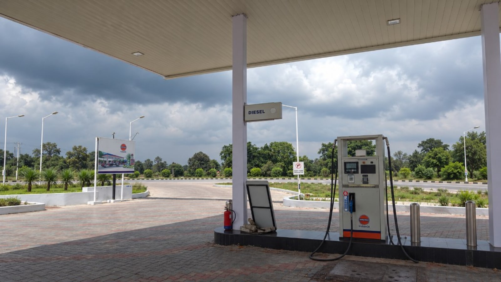 Diesel dispenser under the station canopy on the fuel island