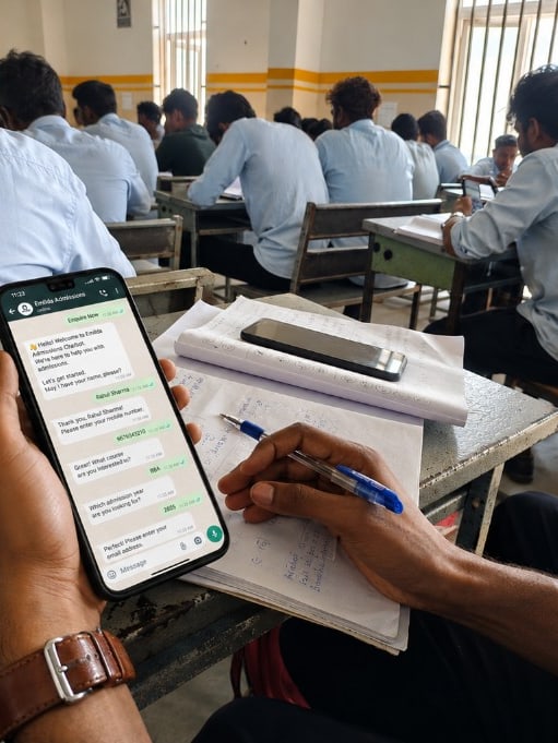 Student using a WhatsApp admissions chatbot on campus