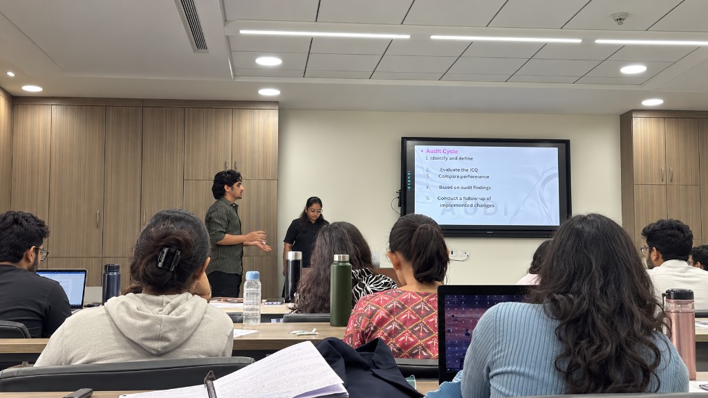 Placement trainers presenting to students in a modern classroom